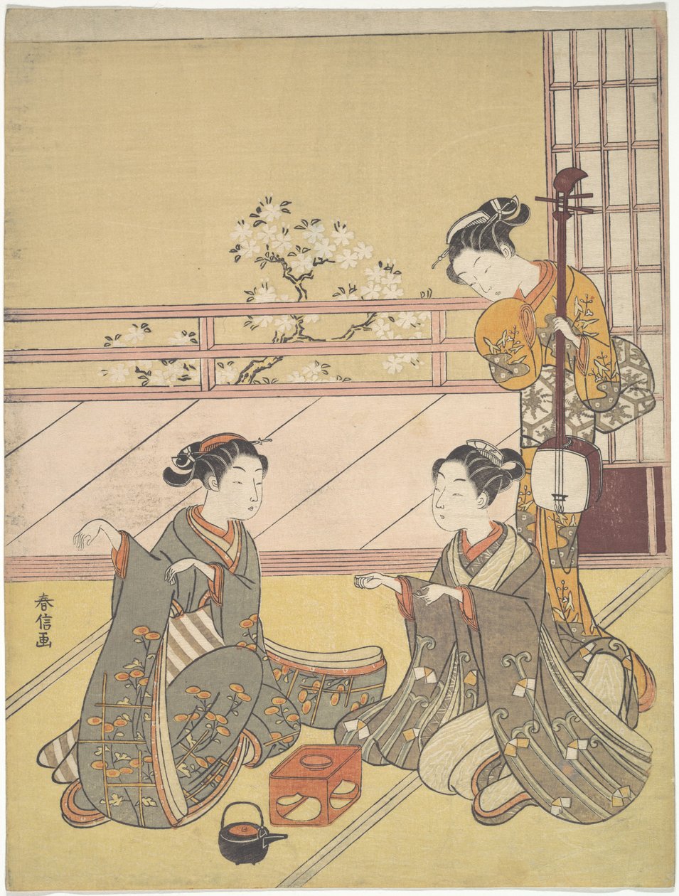 Młode kobiety grające w kitsune-ken (grę lisa) autorstwa Suzuki Harunobu