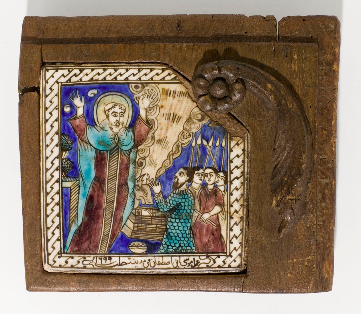 Sygnalizowana i datowana syryjska płytka ceramiczna, malowana manganem, niebiesko-brązowo, datowana na 1699, 1699 autorstwa Syrian School