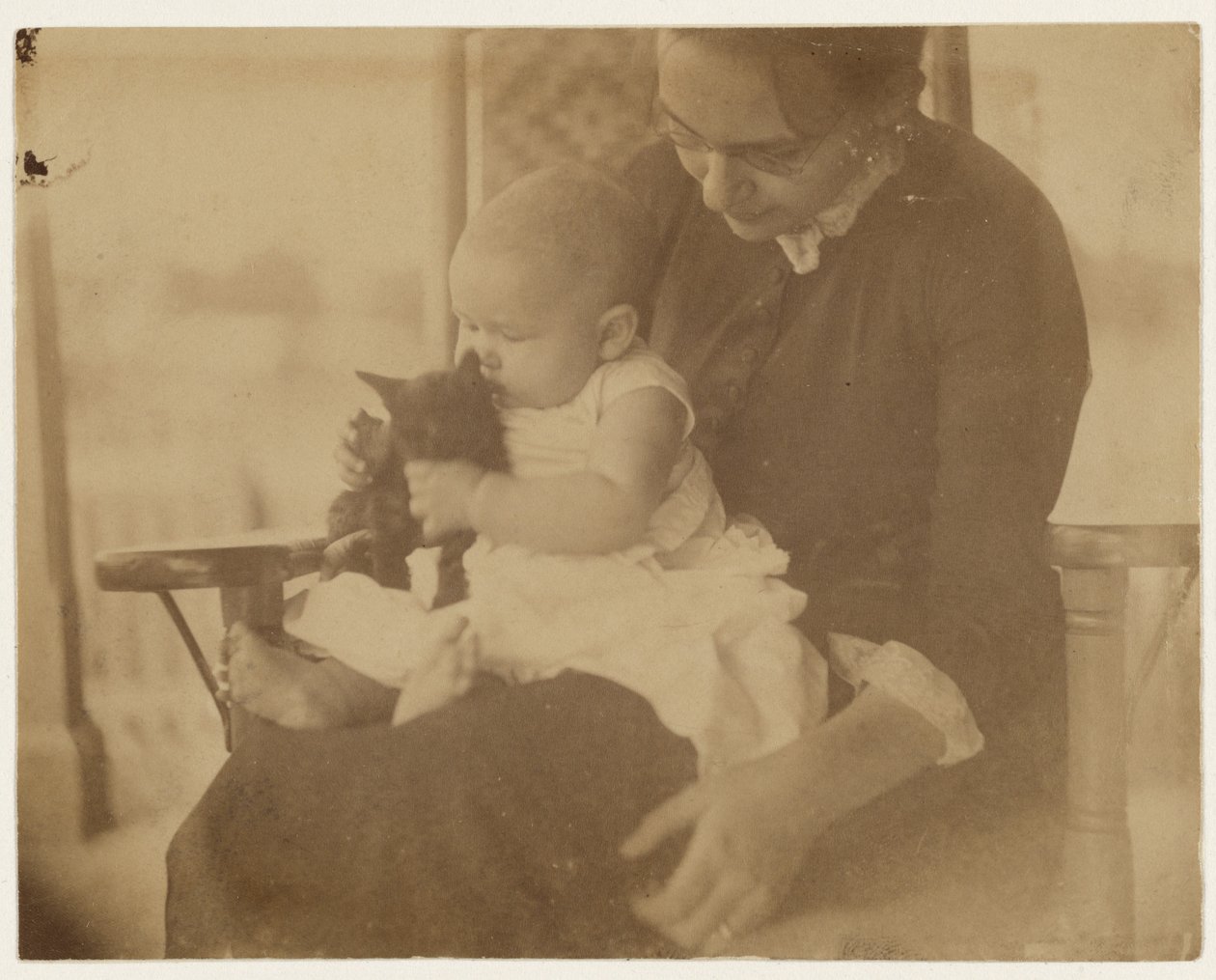 [Frances Crowell i dziecko z kocięciem] autorstwa Thomas Eakins