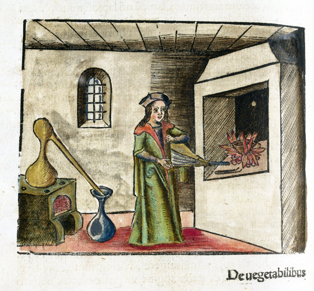 Alchemia XVI wiek: alchemik przy pracy, uruchamiający miech przed kominkiem swojego warsztatu, za nim piec i destylator autorstwa Unbekannt