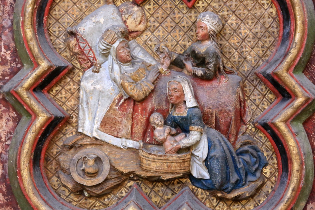 Historia św. Jana Chrzciciela: „Narodziny św. Jana Chrzciciela.” Płaskorzeźba północnego krańca chóru północnego (1531). Kamień polichromowany. 1531. Katedra w Amiens, Amiens, Francja autorstwa Unbekannt