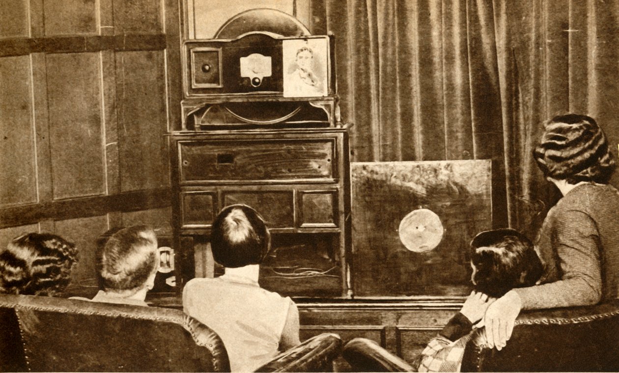 Ludzie oglądający wczesną audycję telewizyjną, ok. 1930, 1933. autorstwa Unbekannt