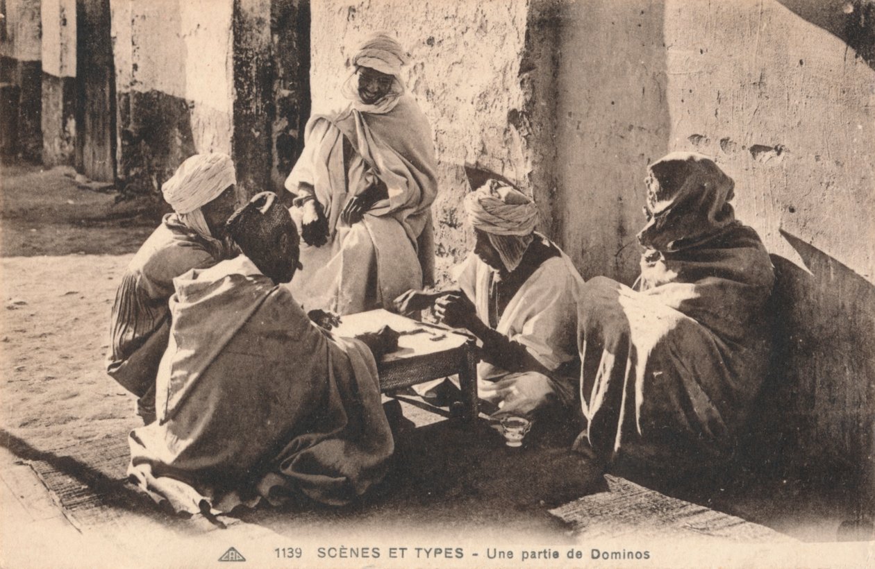 Sceny i typy — gra w domino, c1900 autorstwa Unbekannt