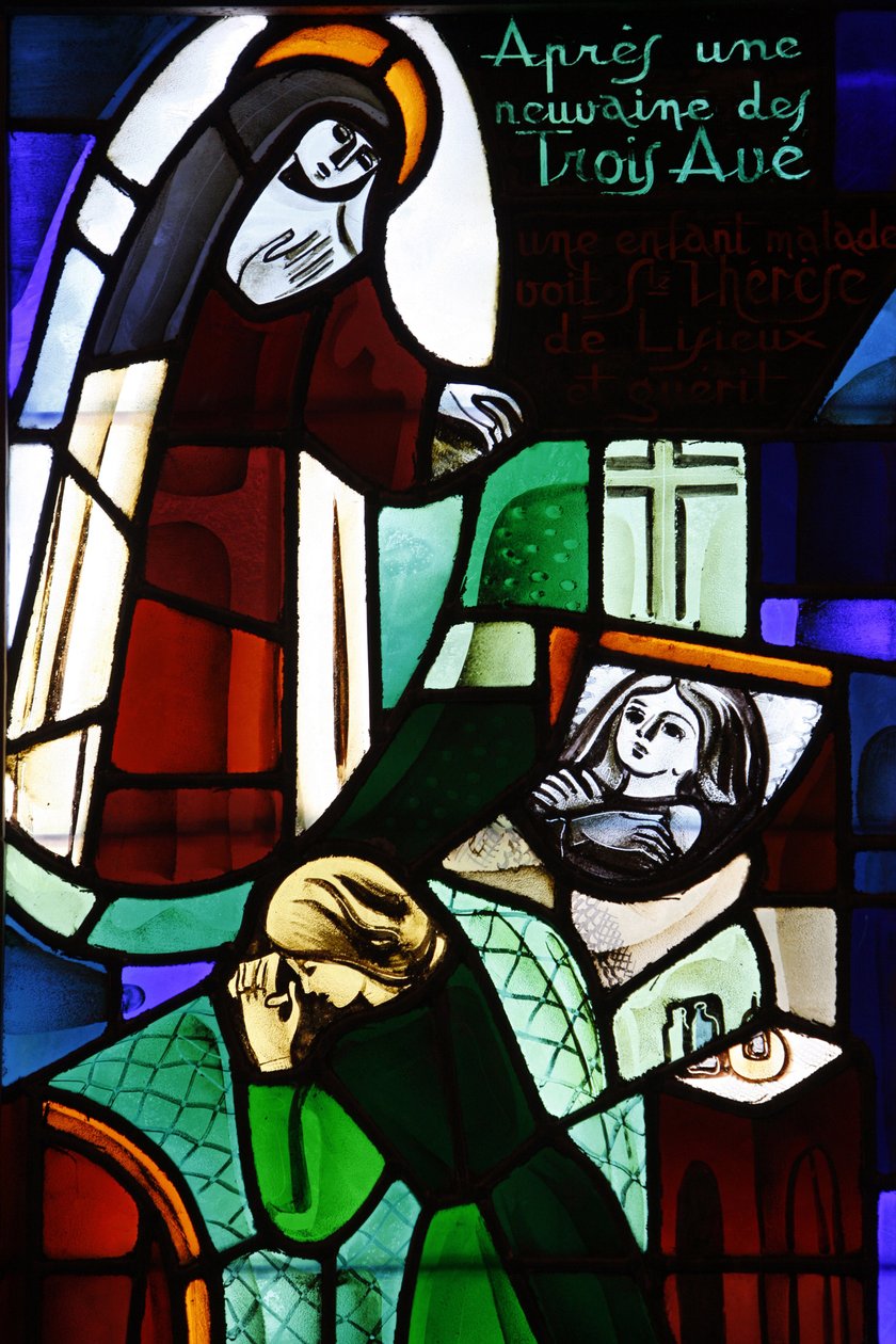 Witraż przedstawiający św. Teresę de Lisieux uzdrawiającą chore dziecko w kościele Notre-Dame-de-la-Trinite, Blois, Francja autorstwa Unbekannt