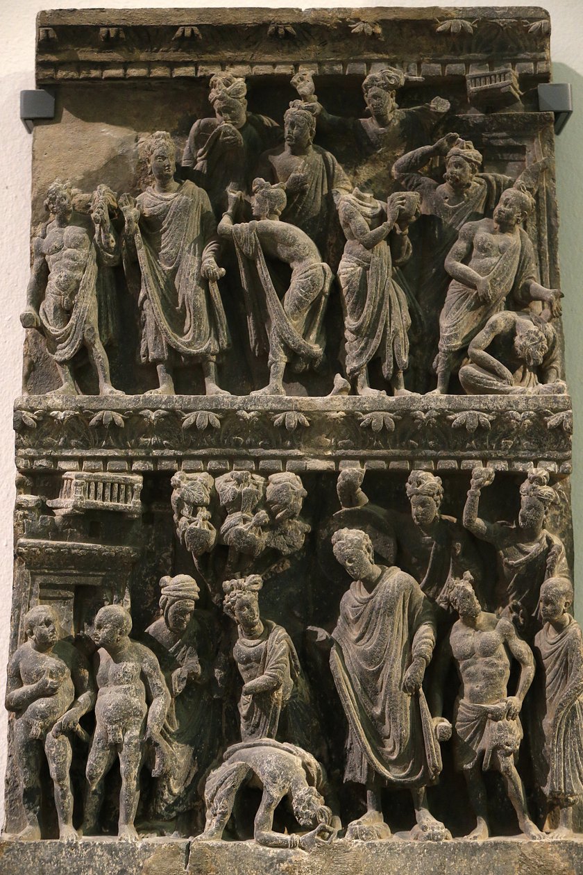 Muzeum Wiktorii i Alberta. Relief ukazujący zamach na życie Buddy. 100-200. Łupek. Gandhara/północno-zachodni Pakistan. Zjednoczone Królestwo autorstwa Unbekannt