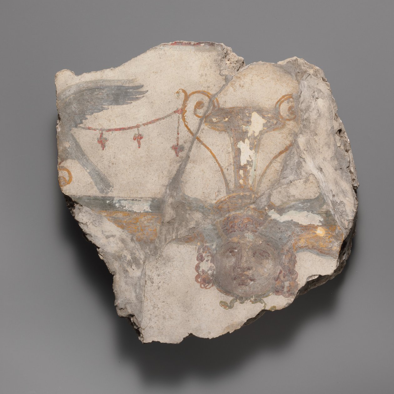 Fragment malarstwa ściennego z maską Gorgona, ca. 14-68 n.e. autorstwa Unbekannt