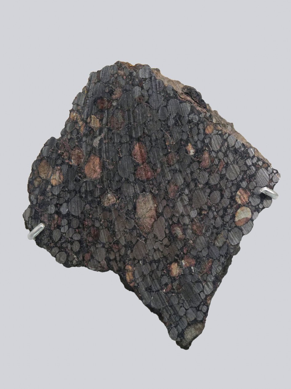 chondryt karbonowy (CBA). Tombee w Gujba (Nigeria) w 1984 r. Narodowe Muzeum Historii Naturalnej w Paryżu. autorstwa Unbekannt