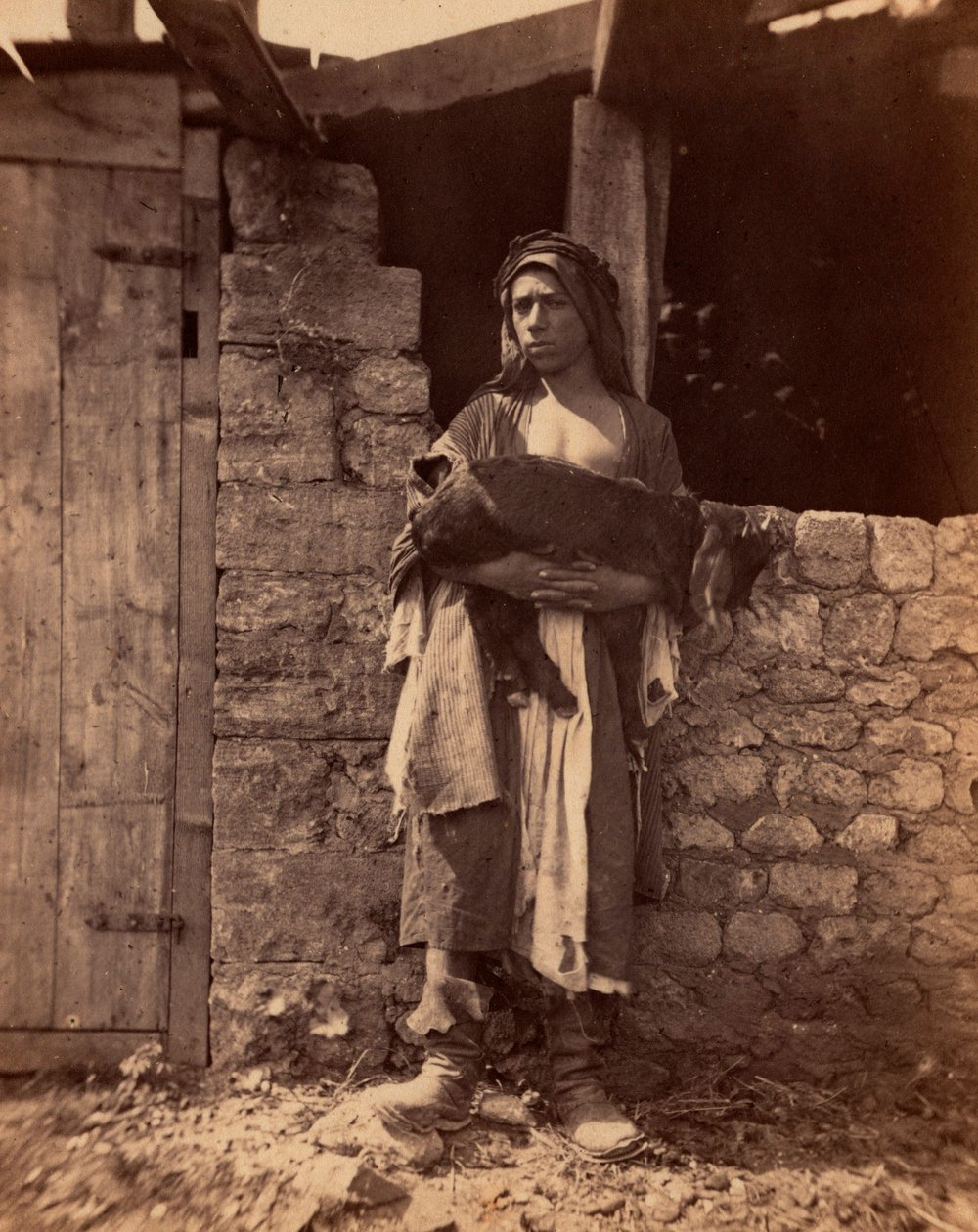 Patre z Libanu z dzieckiem. Fotografia Charlesa Lallemanda (1826-1904) w "Syria, stroje, podróże i krajobrazy". 1865. Kolekcja prywatna. autorstwa Unbekannter Künstler