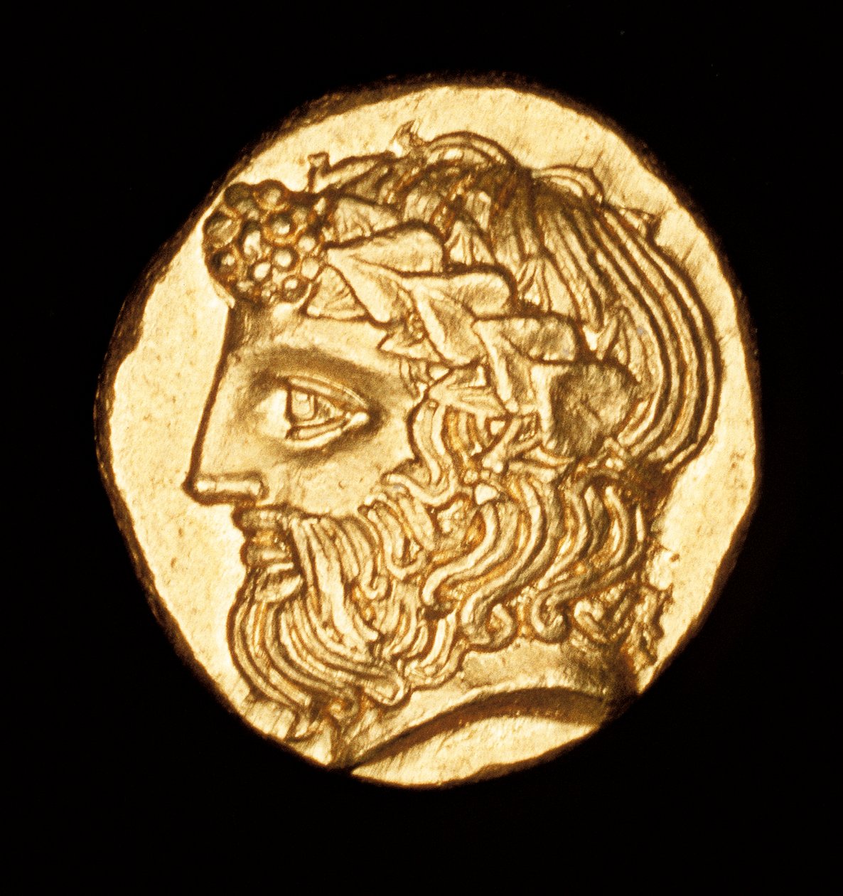Rzadka starożytna grecka moneta, złota, thasos hemidrachm, Dionizos, bóg wina ok. 380 p.n.e. (foto) autorstwa Unbekannter Künstler
