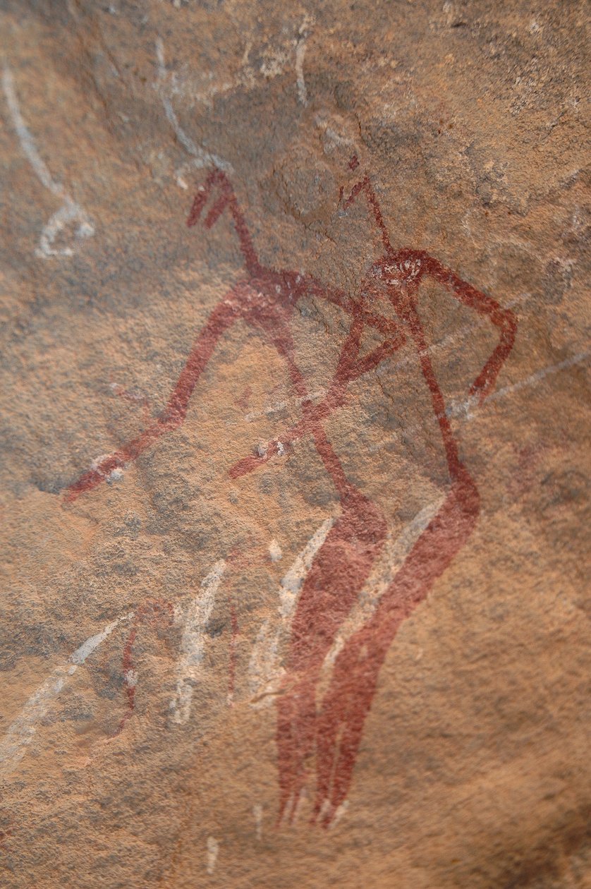 Sztuka naskalna, prehistoria: Malowidło naskalne przedstawiające dwie postacie z lonży w ozdobnym schronie w górach Uweinat w Sudanie. Okres od 8000 do 3000 lat pne. Fotografia autorstwa Unbekannt