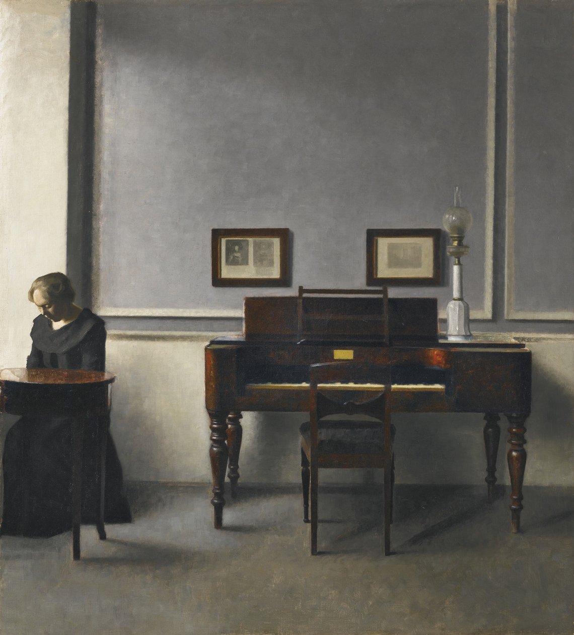 Ida we wnętrzu z pianinem autorstwa Vilhelm Hammershøi