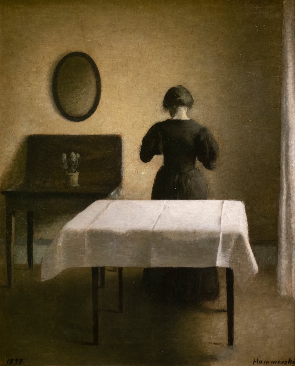 Wnętrze z plecami kobiety autorstwa Vilhelm Hammershoi