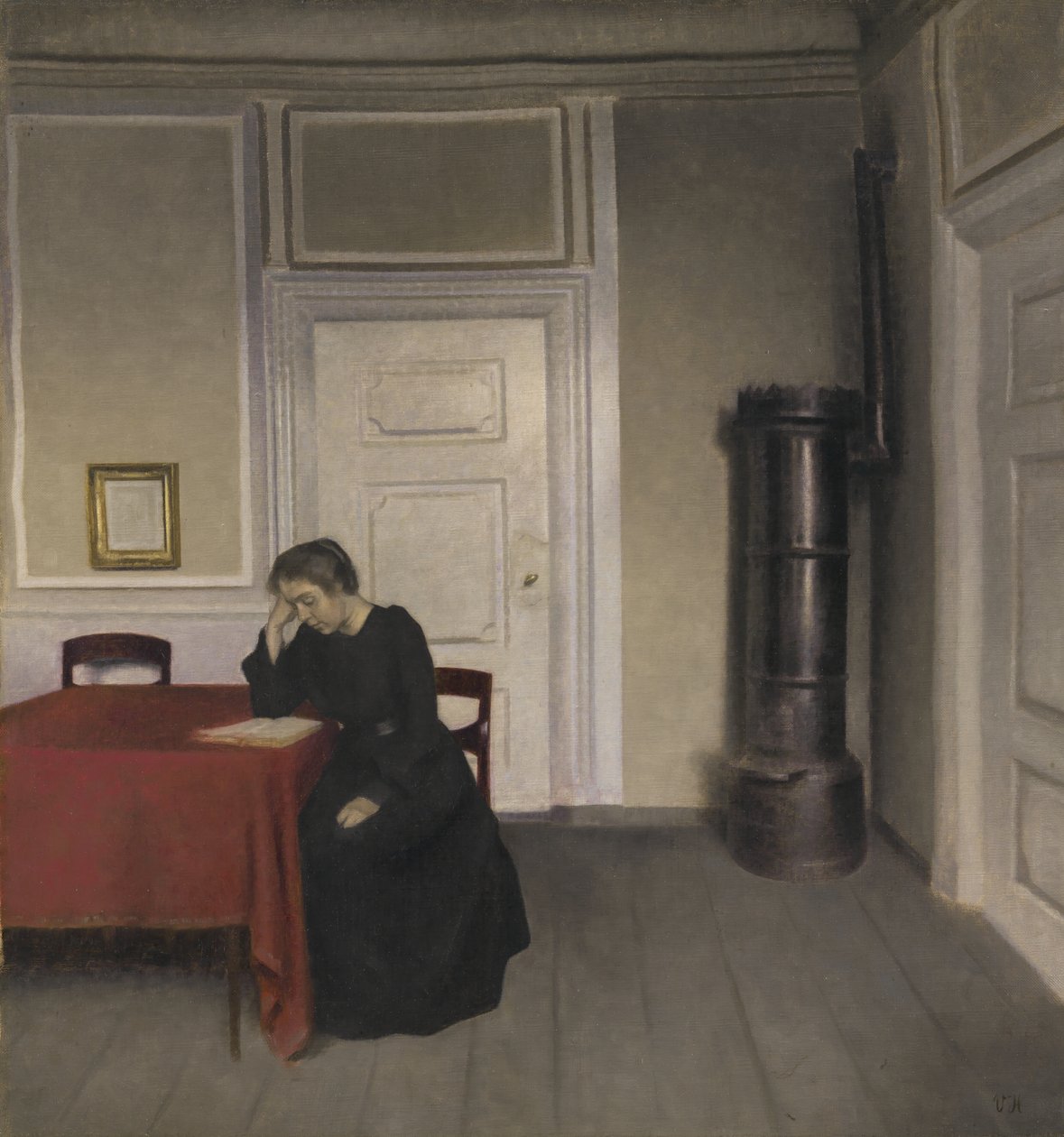 Wnętrze z czytającą kobietą autorstwa Vilhelm Hammershoi
