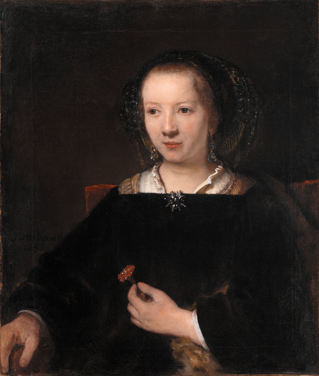 Młoda kobieta z goździkiem autorstwa Willem Drost