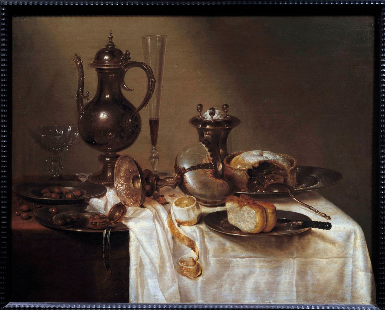 Martwa natura przy żeglarskim Stole zastawionym sztućcami, chlebem, fletem do wina, ciastem i obraną cytryną. Obraz Willema Hedy (1594-1670) 1642 Saint Etienne, Muzeum Sztuk Pięknych autorstwa Willem Claesz. Heda