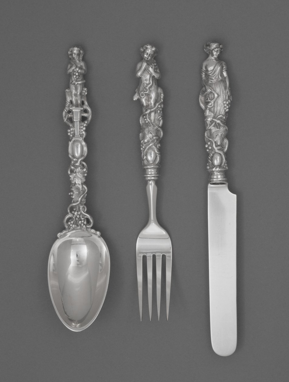 Zestaw dziecięcych sztućców (nóż, widelec i łyżka), ok. 1900 r. 1865-1874 (srebrny) autorstwa William Bogert
