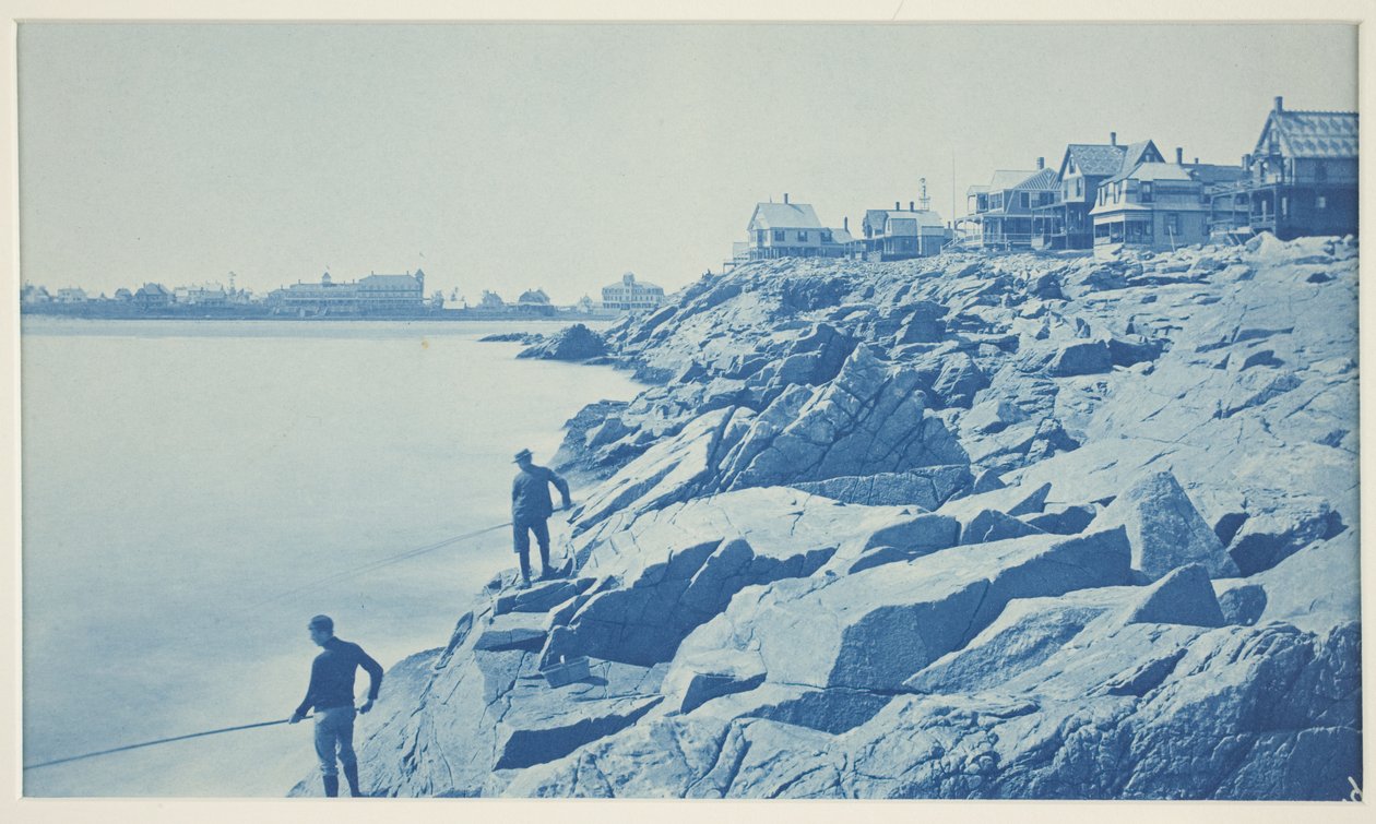 Dwóch mężczyzn łowi ryby ze skał w Seaside Resort autorstwa William H. Cades