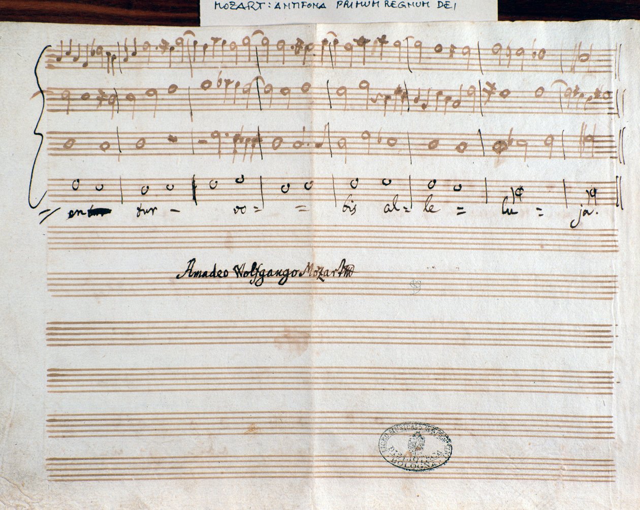 Strona z sygnaturą kompozytora Querite po raz pierwszy w królestwie Bożym Mozarta dla uzyskania tytułu Accademico filarmonico (1770) autorstwa Wolfgang Amadeus Mozart