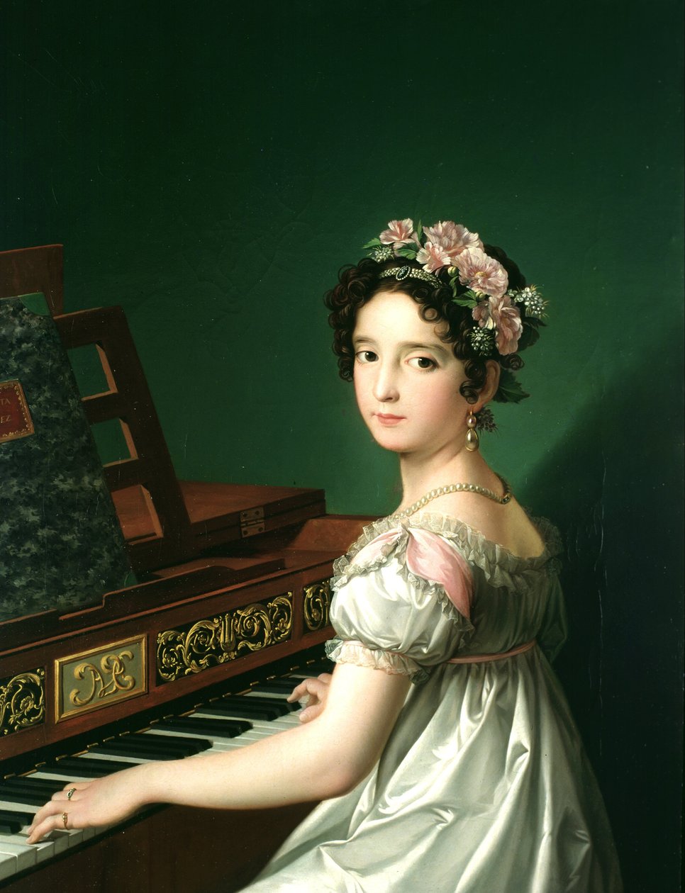 Manuela González Velázquez grająca na pianinie autorstwa Zacarias Gonzalez Velazquez