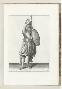 Ćwiczenie z tarczą i włócznią: żołnierz trzykrotnie odkłada włócznię do pozycji spoczynkowej, ruch drugi (nr 11), 1618 Nassausche Wapen-Handelinge, van Schilt, Szpiedzy, Rappier i Tarcza: przedstawione beyde figuerlick, a obramowane po autorstwa Adam van Breen