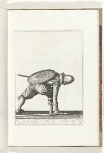 Ćwiczenie Tarcza i Kolec: Żołnierz pochyla się, aby podnieść Kolec (nr 28), 1618 Nassausche Wapen-Handelinge, van Schilt, Szpiedzy, Rappier i Tarcza: przedstawiony beyde figuerlick, oprawiony w nowy porządek [z] (...) Maurits van Nassau (t autorstwa Adam van Breen