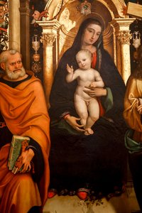 Madonna z Dzieciątkiem ze świętymi. XVI wiek (olej na drewnie) autorstwa Agostino Marti