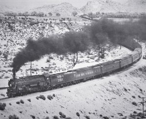 Pociąg „Grand Canyon Limited” linii kolejowej Santa Fe na przełęczy Cajon w Victorville w Kalifornii autorstwa American Photographer
