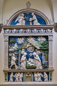 Narodzenie Pańskie, Adoracja pasterzy i Zwiastowanie autorstwa Andrea (workshop of) Della Robbia