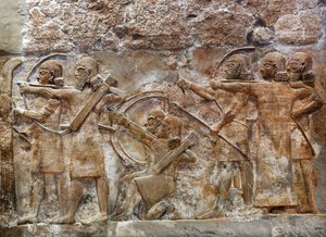 Łucznicy armii asyryjskiej zdobywający ufortyfikowane miasto, relief z Nimrud, ok. 865 pne autorstwa Assyrian