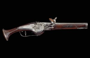 Pistolet karyncki (Ferlach) z blokadą kołową i wewnętrznym automatycznym systemem bezpieczeństwa, ok.1650 (stal i orzech) autorstwa Austrian School