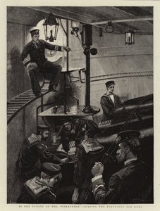 W wieżyczce H M S Conqueror, ładowanie czterdziestopięciotonowych dział autorstwa Charles J. Staniland
