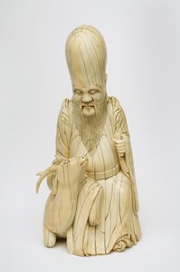 Rzeźbiona figurka Shou Xing siedzącego z jeleniem z kości słoniowej, ok. 1580-1644 autorstwa Chinese School