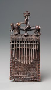 Thumb Piano, koniec XIX wieku (drewno i żelazo)