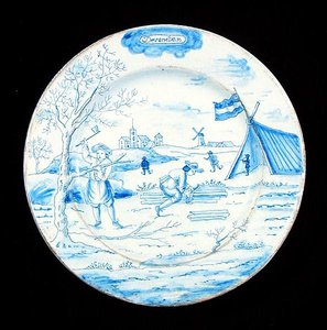 Tabliczka Delftware przedstawiająca miesiąc grudzień (ceramika glazurowana cyną) autorstwa Dutch School