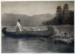 Indianie Ameryki: Indianin na łodzi kajakowej w południowym jeziorze Flathead w stanie Montana autorstwa Edward Sheriff Curtis