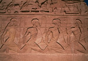 Więźniowie Północy, płaskorzeźba u podstawy gigantów Wielkiej Świątyni Ramzesa II, Abu Simbel (lista światowego dziedzictwa UNESCO) autorstwa Egyptian 19th Dynasty