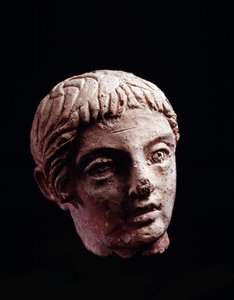 Cywilizacja etruska: głowa młodzieńca ze świątyni Belvedere, w Orvieto - V-IV wpne Średnica 13 cm autorstwa Etruscan
