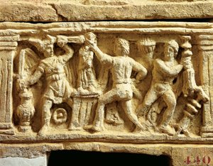 Cywilizacja etruska, urna tufu ze scenami plądrowania świątyń przez Galów autorstwa Etruscan