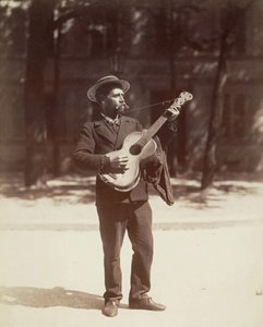 Gitarzysta, Paryż autorstwa Eugène Atget
