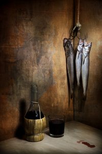 Rustykalne ryby i wino autorstwa Felice Angelino