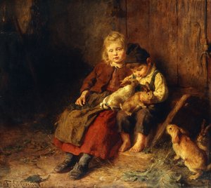 Dwoje dzieci bawiących się z królikami,