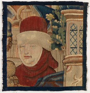 Mały fragment arrasu przedstawiającego głowę męską, koniec XV w. (wełna)