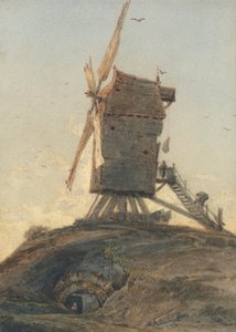 Molino de viento en un Cnoll en un Paisaje Polonia