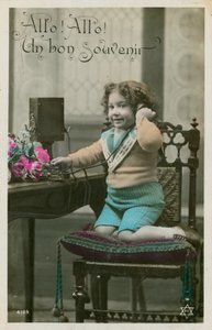 Dziecko korzystające z telefonu autorstwa French Photographer