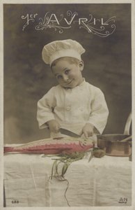 Mały chłopiec gotujący rybę (kolorowe zdjęcie) autorstwa French Photographer