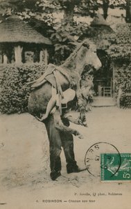 Robinson, Chacun don tour. Młody człowiek niosący osła