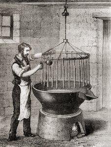 Handlarz wyrabiający świece w XIX wieku, z "Les Merveilles de la Science", opublikowanego ok. 1870 r. (rycina) autorstwa French School