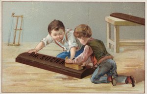 Dzieci konstruujące dużą drewnianą tabliczkę czekolady reklamującą Suchard Chocolate