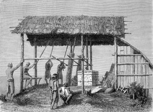 Ilustracja opublikowana w wydaniu „Le Tour du monde” z 1862 r. przedstawiająca kowala w dajakach na wyspie Borneo. Rytownictwo. autorstwa French School