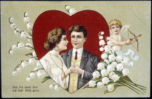 Para zakochanych w sercu w otoczeniu konwalii i Kupidyna (Eros) - pocztówka niemiecka, XX wiek autorstwa German School